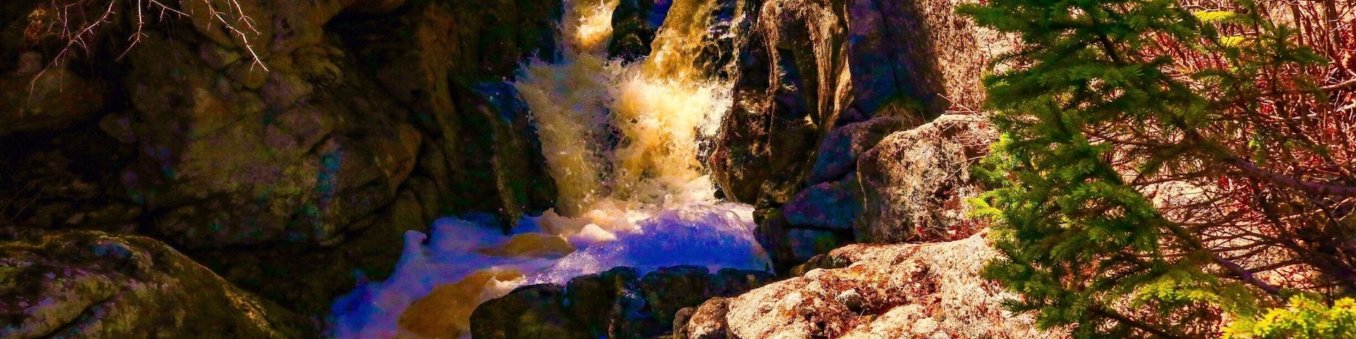 This waterfall runs through 2 private properties. Drive on Herring Cove Road until you get to Ashley Drive. Park outside of the gate and follow the stream down to the falls.