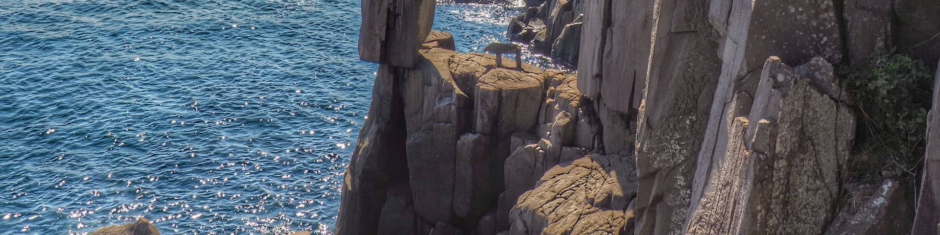 There are many fascinating hikes and sights in Nova Scotia, Canada but the Balancing Rock on Long Island is one you won't forget.