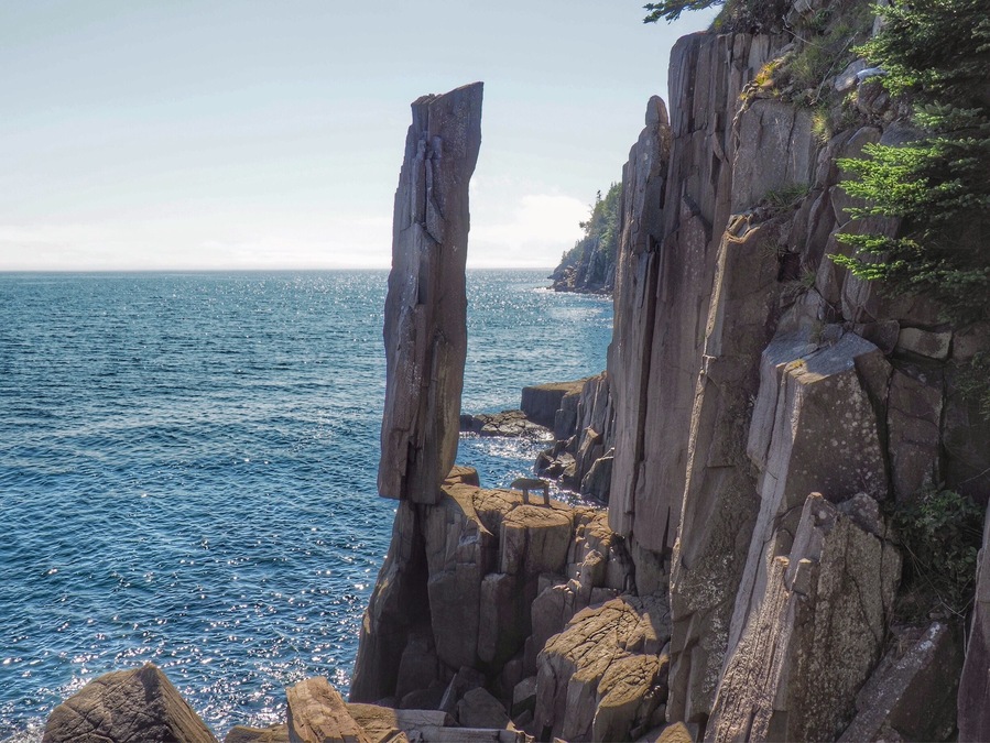 There are many fascinating hikes and sights in Nova Scotia, Canada but the Balancing Rock on Long Island is one you won't forget.