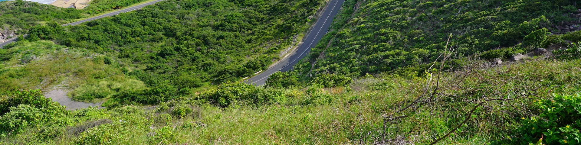 Landscape view of the Caribbean Sea and Atlantic Ocean looking south of St Kitts island from the top of Timothy Hill