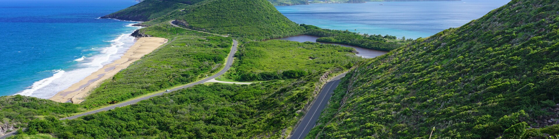Landscape view of the Caribbean Sea and Atlantic Ocean looking south of St Kitts island from the top of Timothy Hill