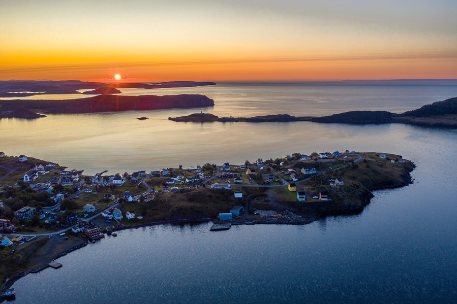 Land and ocean intermix in layers of peninsula, bays and sea strites, fishing village of Trinity, Newfoundland, Canada