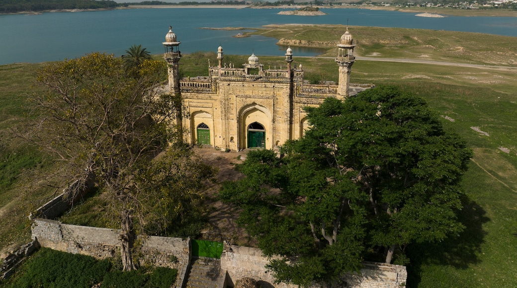Aerial view of abandoned Mughal Mosque in the shore of Khanpur Dam, Islamabad, Pakistan