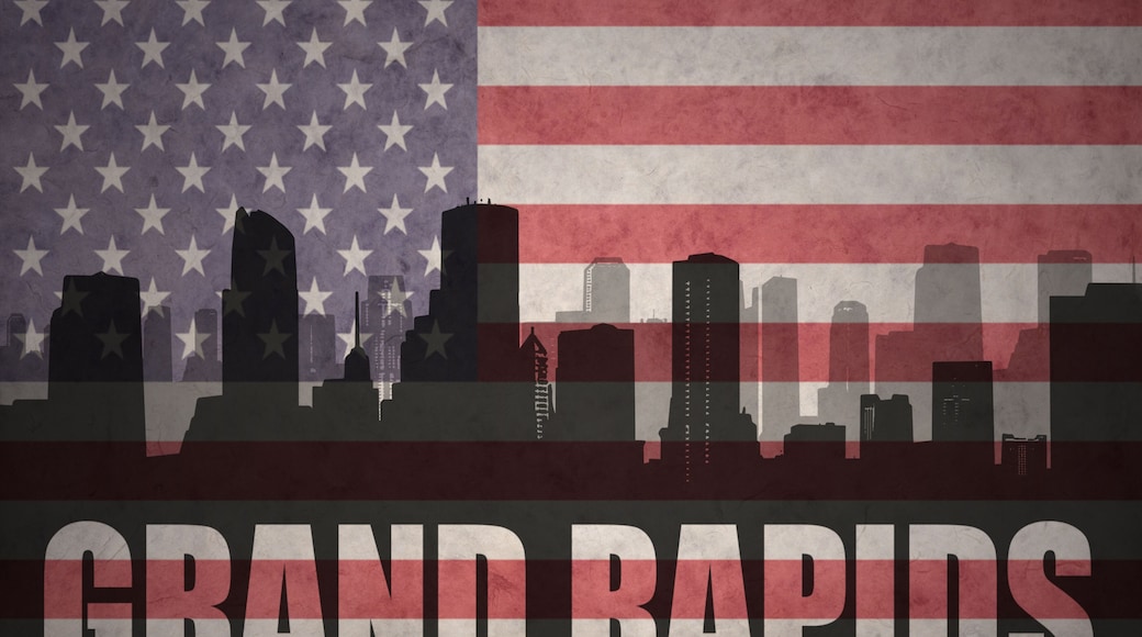 abstract silhouette of the city with text Grand Rapids at the vintage american flag