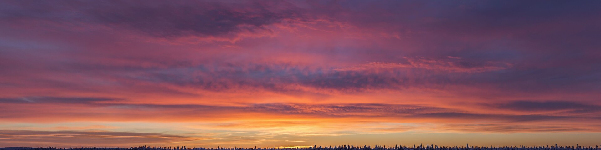 Sunrise Clouds Over The Porcupine River; Old Crow, Yukon, Canada