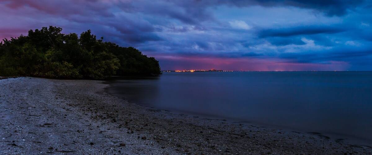 Cloudy moonlit night on the beach facing Fort Myers Beach.  #beachtips #BVSblue