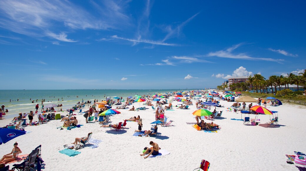 Fort Myers Beach featuring a beach as well as a large group of people