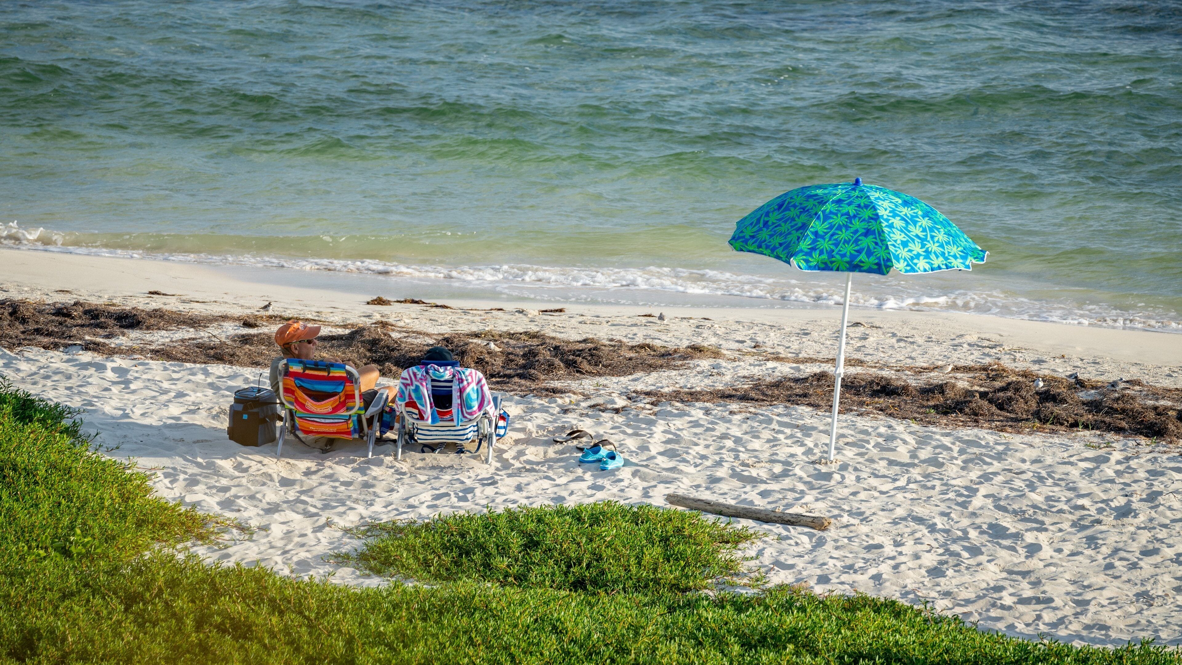Bahia Honda State Park featuring general coastal views and a sandy beach as well as a couple