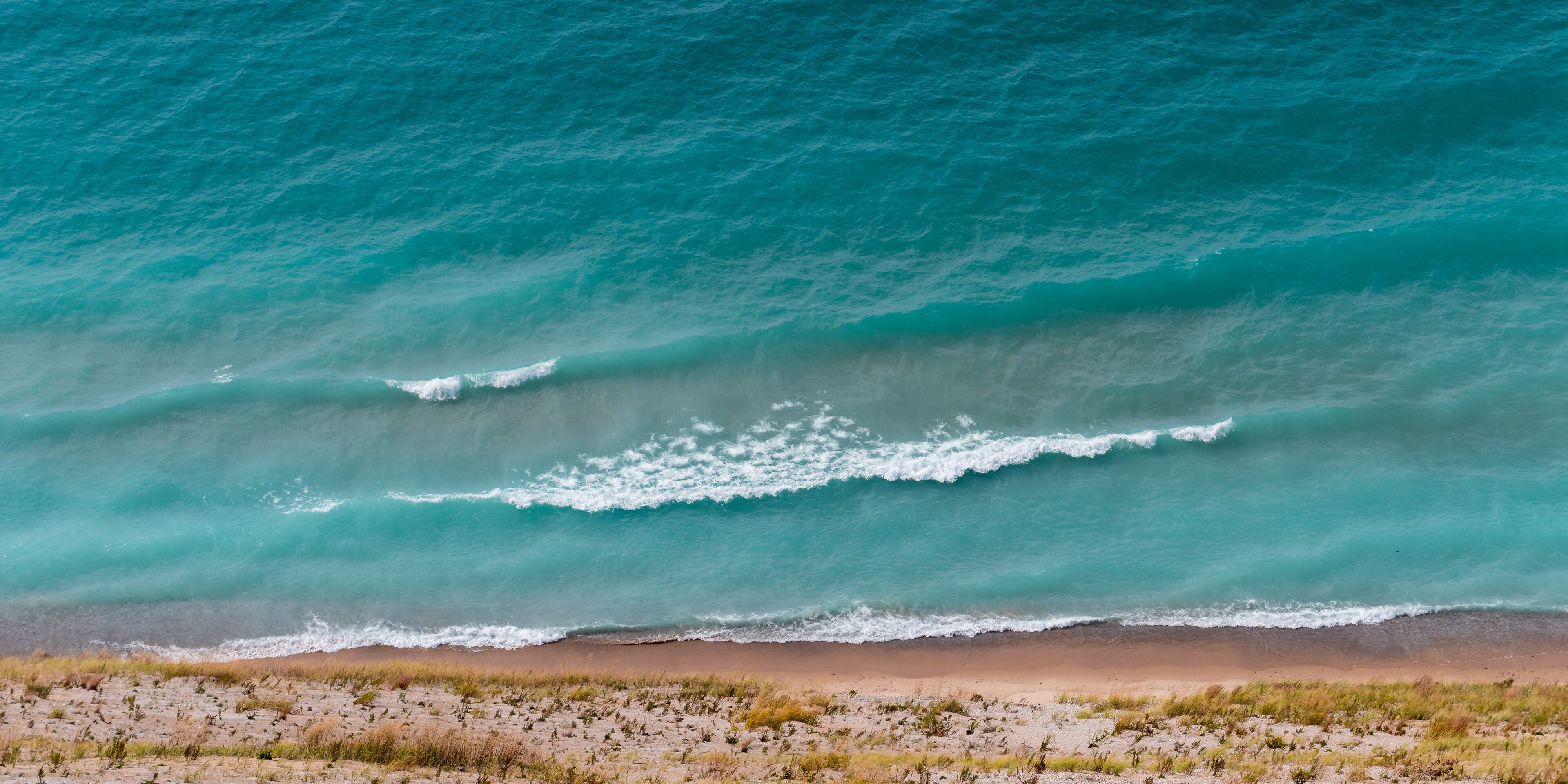 View of Lake Michigan from the top of a dune at Sleeping Bear National Seashore in Michigan.