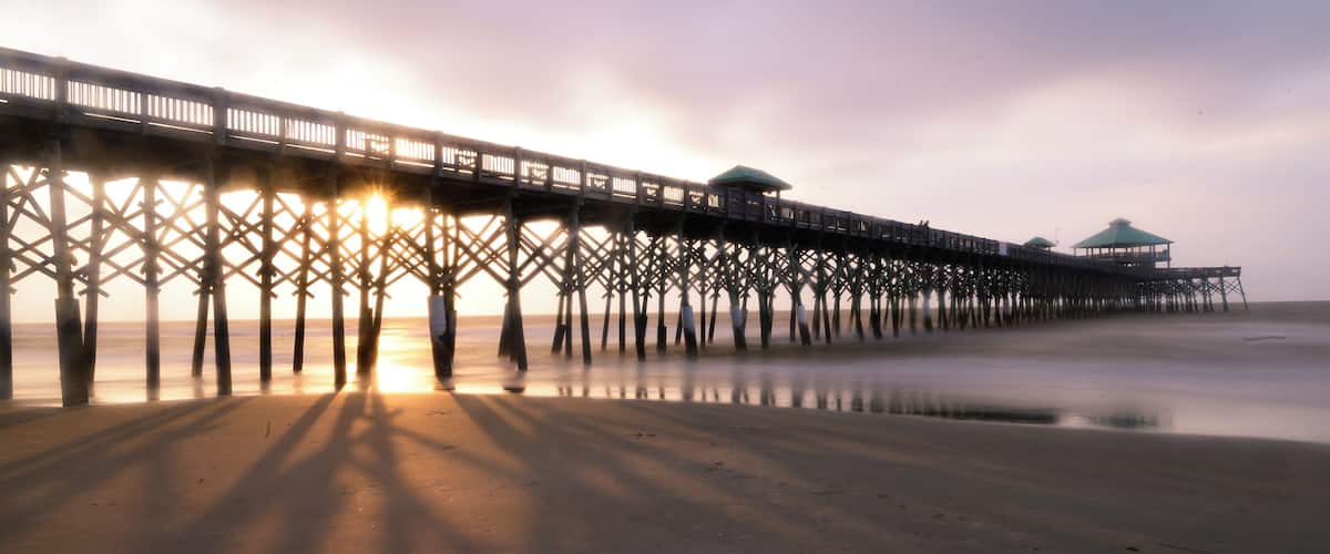 Sunrise as the rays dance through the logs...