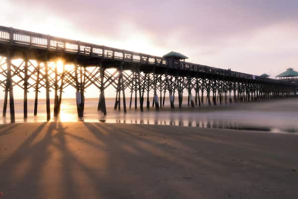 Sunrise as the rays dance through the logs...