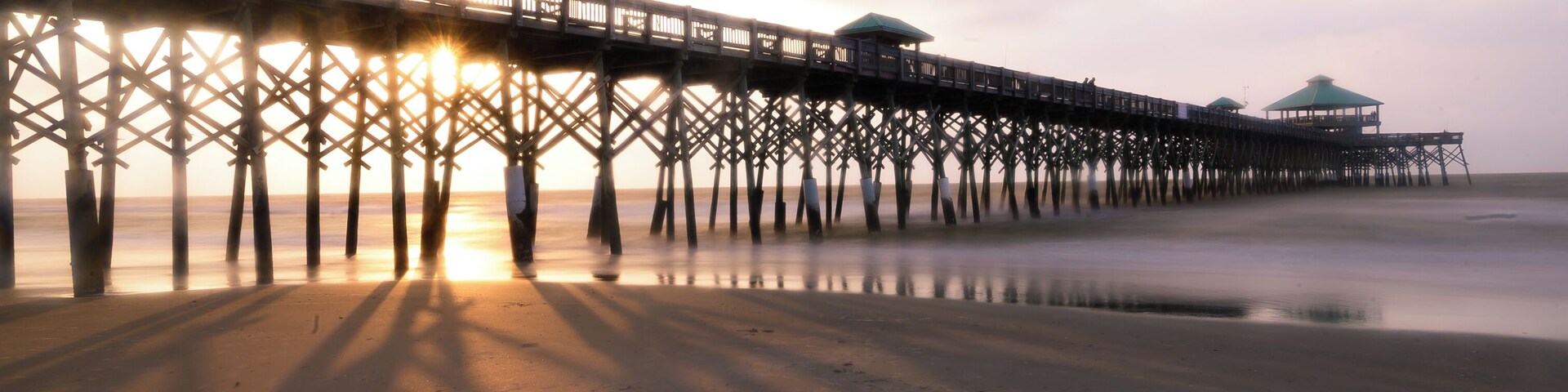 Sunrise as the rays dance through the logs...