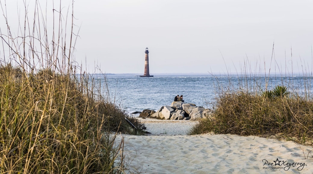The Morris Island lighthouse stands alone approximately 300 yards off shore from the Island of Folly Beach. #roadtrip