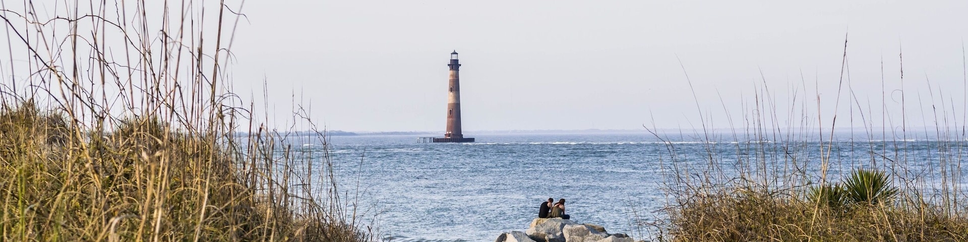 The Morris Island lighthouse stands alone approximately 300 yards off shore from the Island of Folly Beach. #roadtrip