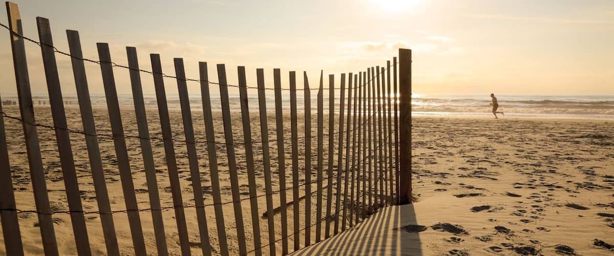 Folly Beach featuring general coastal views, a sunset and a sandy beach