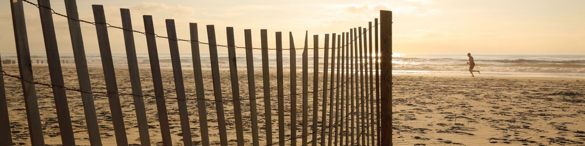 Folly Beach featuring general coastal views, a sunset and a sandy beach