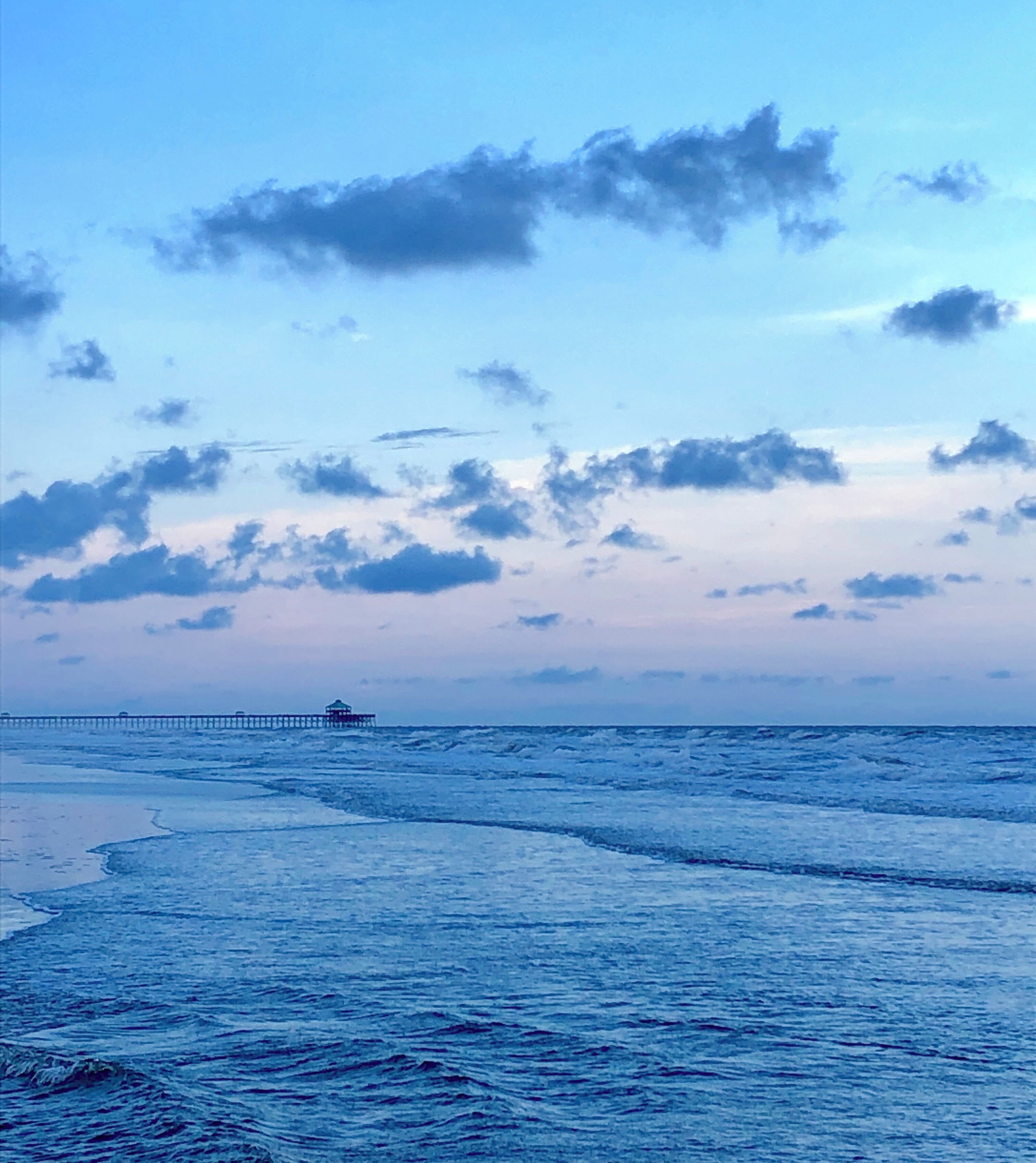 Beautiful summers eve at the edge of America. Learning to surf and beach yoga makes life great #adventure #summernights #warmocean #smallwaves