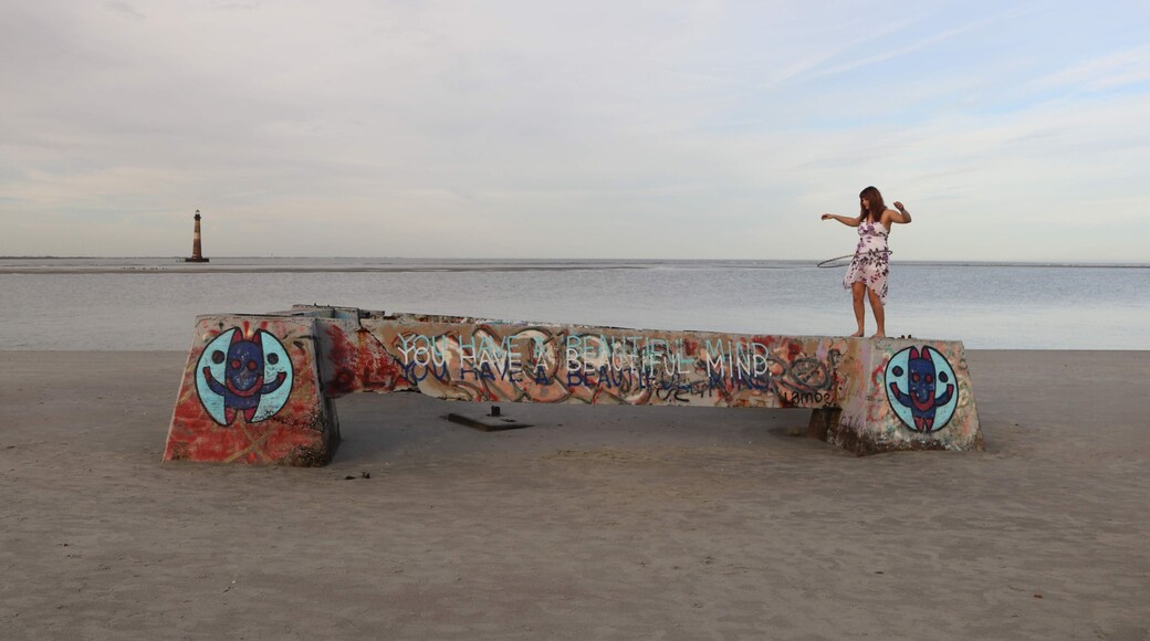 Hula hooping amidst lighthouses and vandalized concrete structures #Adventure