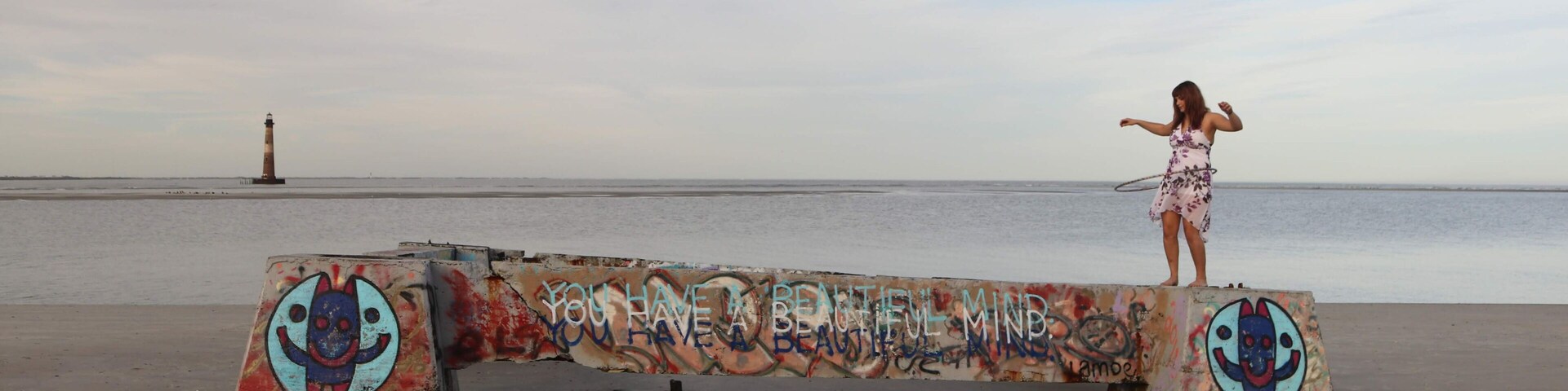 Hula hooping amidst lighthouses and vandalized concrete structures #Adventure