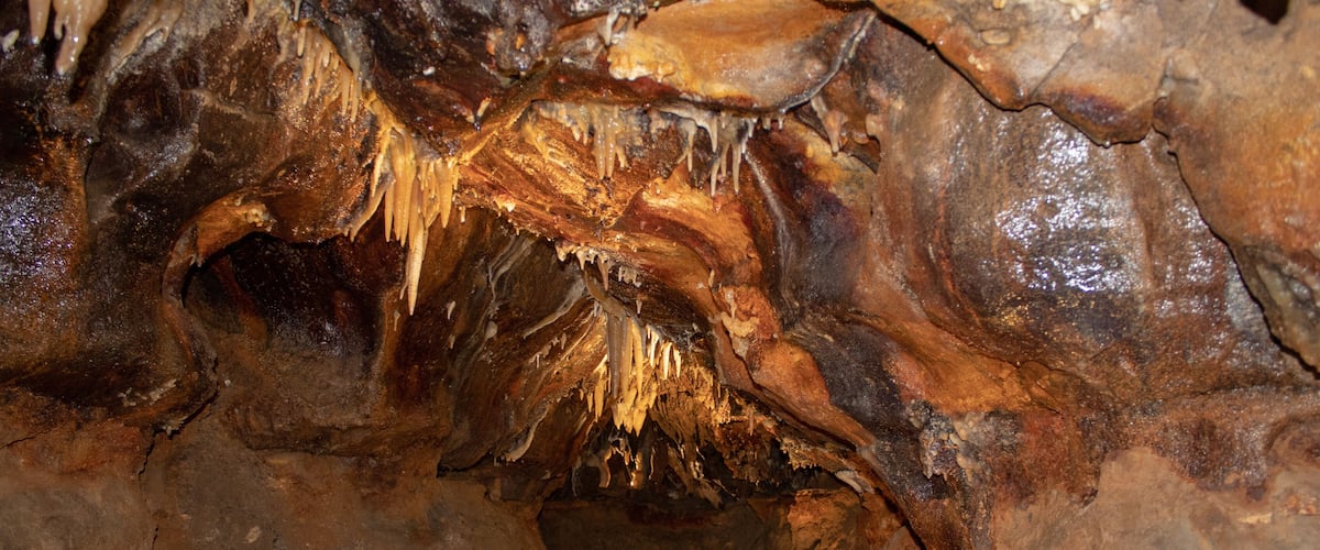 A cave with stalactites and stalagmites.