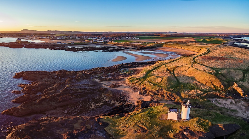 Aerial view of Elie Ness Lighthouse at sunset on the coast of The Kingdom of Fife. Scotland, UK