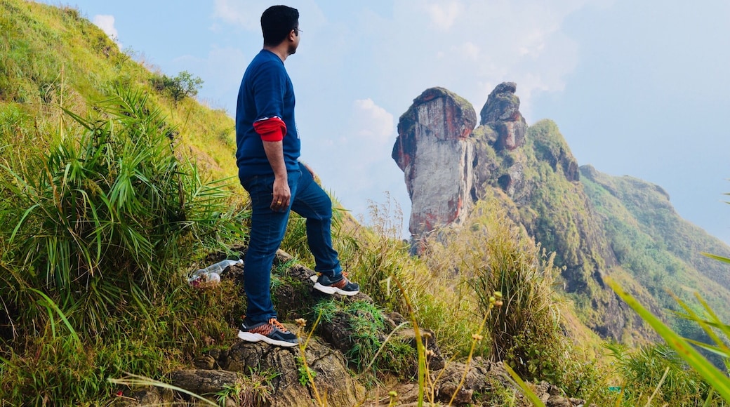 Illikal Kallu is a major tourist attraction spot in (Moonnilavu Village),Kottayam district of Kerala (India). Situated about 4000 feet above sea level, it is also one of the highest peak in the Western ghats. Illikal Kallu is a rock situated above Illikal Mala. The thing that makes this rock unique is that half of the rock has fallen off, and only the other half remains. The nearest city is Teekoy.
Awesome #cool#trekking #adventure#TakeAhike ❄️🌧🌧🏔⛰😎