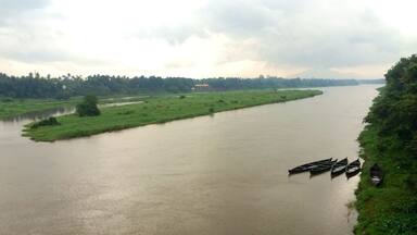 Kalady (Malayalam: àŽàŽŸàŽČàŽàŽż) is a census town located east of the Periyar river, in the Ernakulam district of Kerala, India. Notably, it is the birthplace of Sri Adi Shankara, and a popular destination for pilgrims. Kalady started featuring in the spiritual map of India only after its rediscovery in the late 19th century by the then Shankaracharya of Sringeri and the subsequent consecration of a temple for Sri Adi Shankara in 1910.
Kalady Kadavu (Aaraattu Kadavu)
The Kalady Kadavu is the place where the river took its turn, and where Kalady was born. It was also the place where Sankara had first performed Aaraattu (a river bath of an idol) for his ancestral deity before installing it at its current location.
Crocodile Ghat
The "Muthala Kadavu," or Crocodile Ghat, is where Sankara's life turned to Sanyasam (Ascetic life).
His mother, Aryadevi, did not agree with his desire to become a Sanyasin. Legend says that one day, Sankara was touched by a dog and, as per custom followed by the community, Sankara had to take bath. Accompanied by mother, Sankara went to river Poorna to bathe. While in the water, a crocodile caught hold of his leg. The drowning Sankara told his mother that the crocodile would leave him alone if she would allow him to take up Sanyasa. Helpless, his mother agreed, and the crocodile freed Sankara.