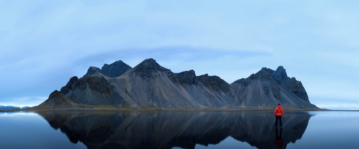 Stokksnes
My favourite location in Iceland. So many photography possibilities here. We had luck to get perfectly still water so we could photograph reflections of the mountains ahead. Its not photoshop, im not standing on the water, the water level is just so low that you can walk like that pretty long distances :)
#adventure