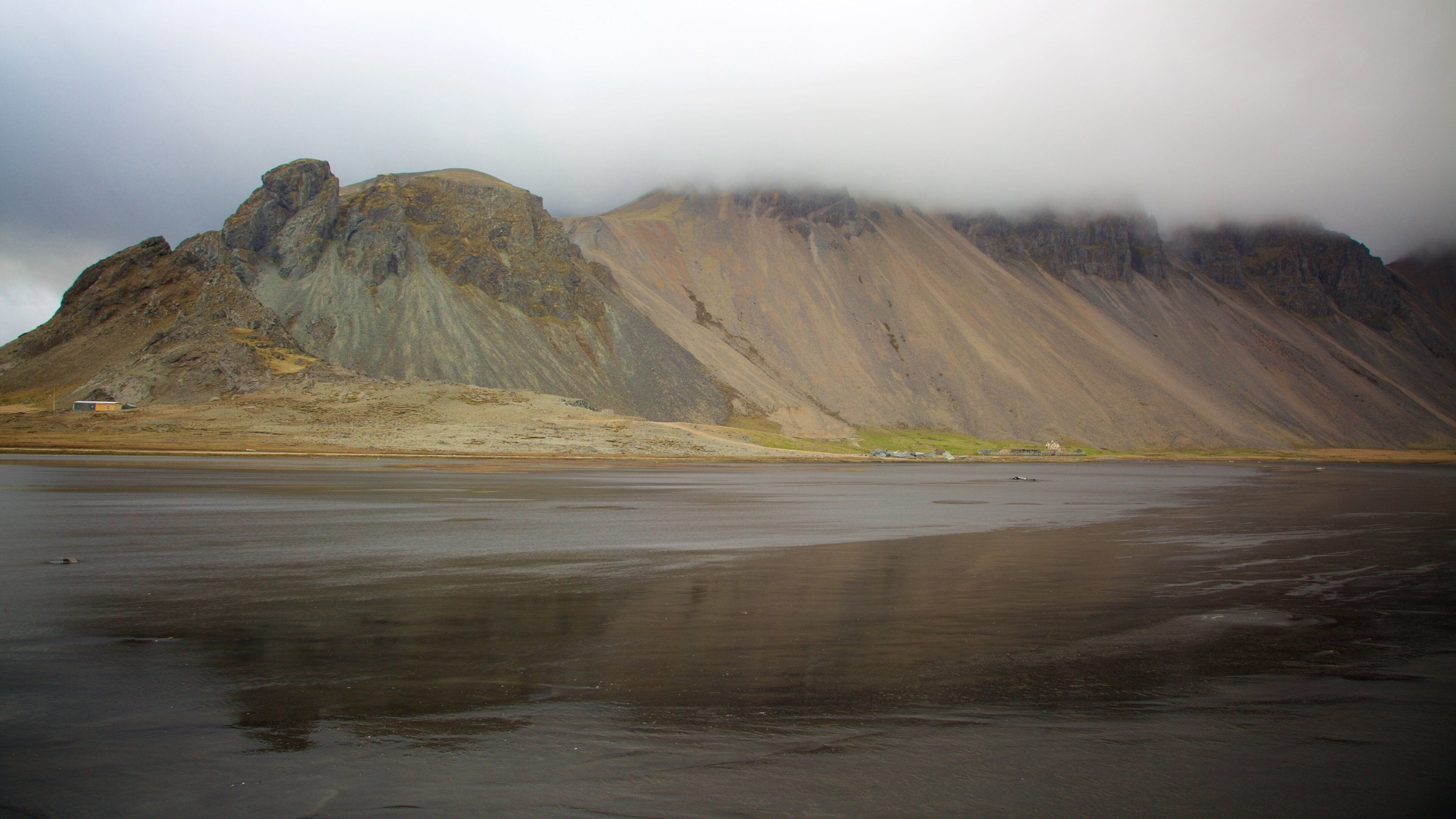 Hofn which includes general coastal views, mist or fog and mountains