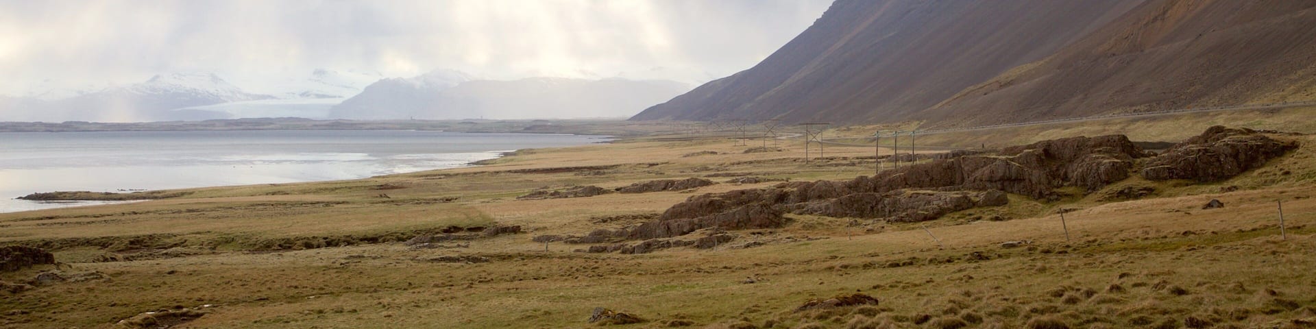 Hofn showing mountains, tranquil scenes and mist or fog