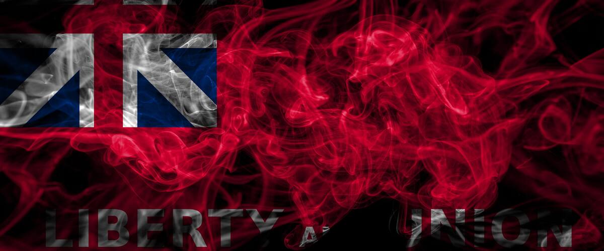 A stylized representation of the AK flag with smoke effects and the words "LIBERTY UNION".