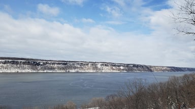 Winter landscape overlooking the Hudson River towards from Inwood Hill Park in Manhattan to the Palisades Park in New Jersey