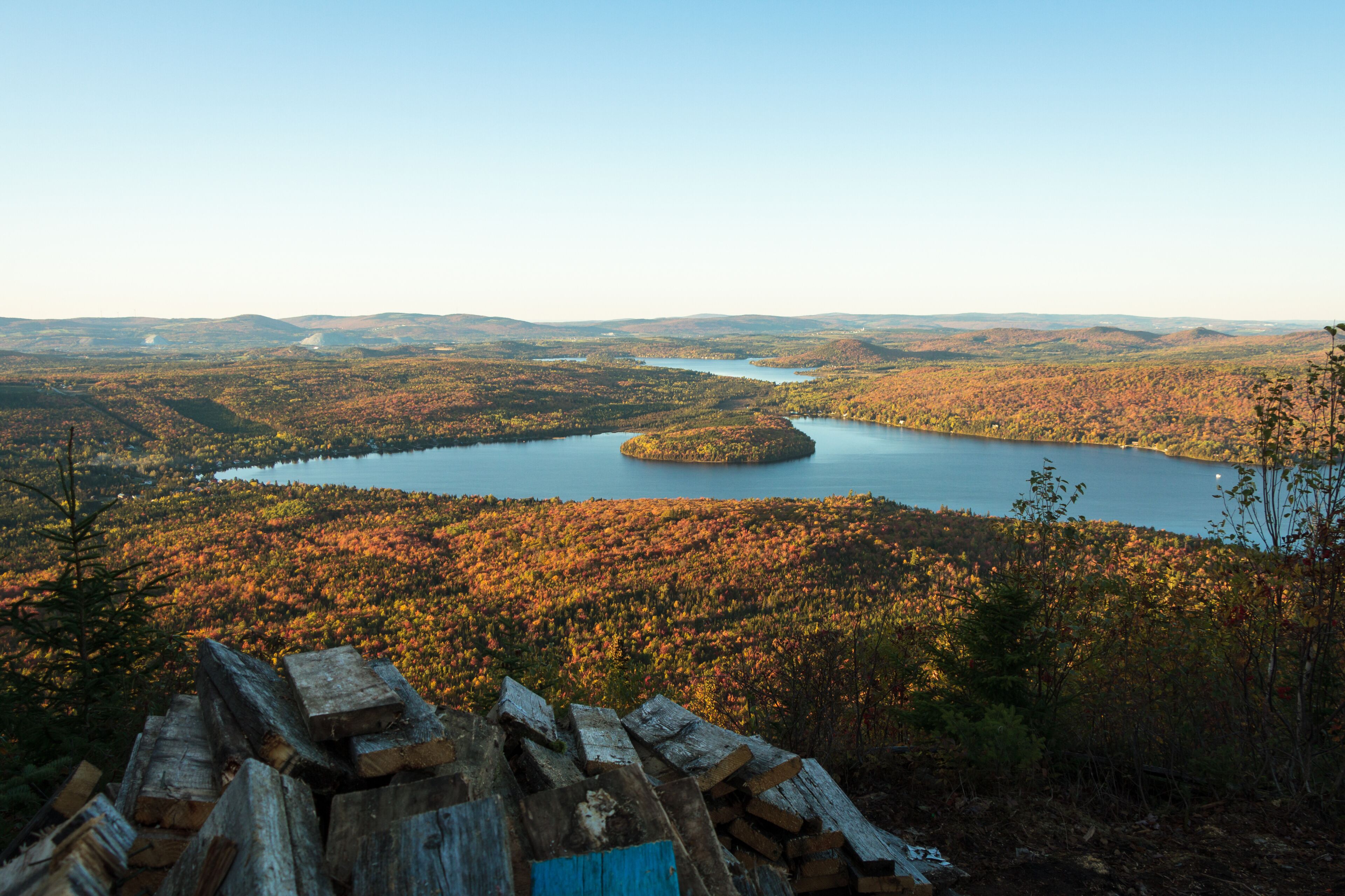 Autumn scene: lakes, mountains and forest in colorful fall season viewd from Adstock Mount, Qc. Canada