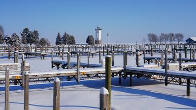 Fond du Lac, Wisconsin's lighthouse standing out in the Winter season of February at Lakeside Park Winter Wonderland