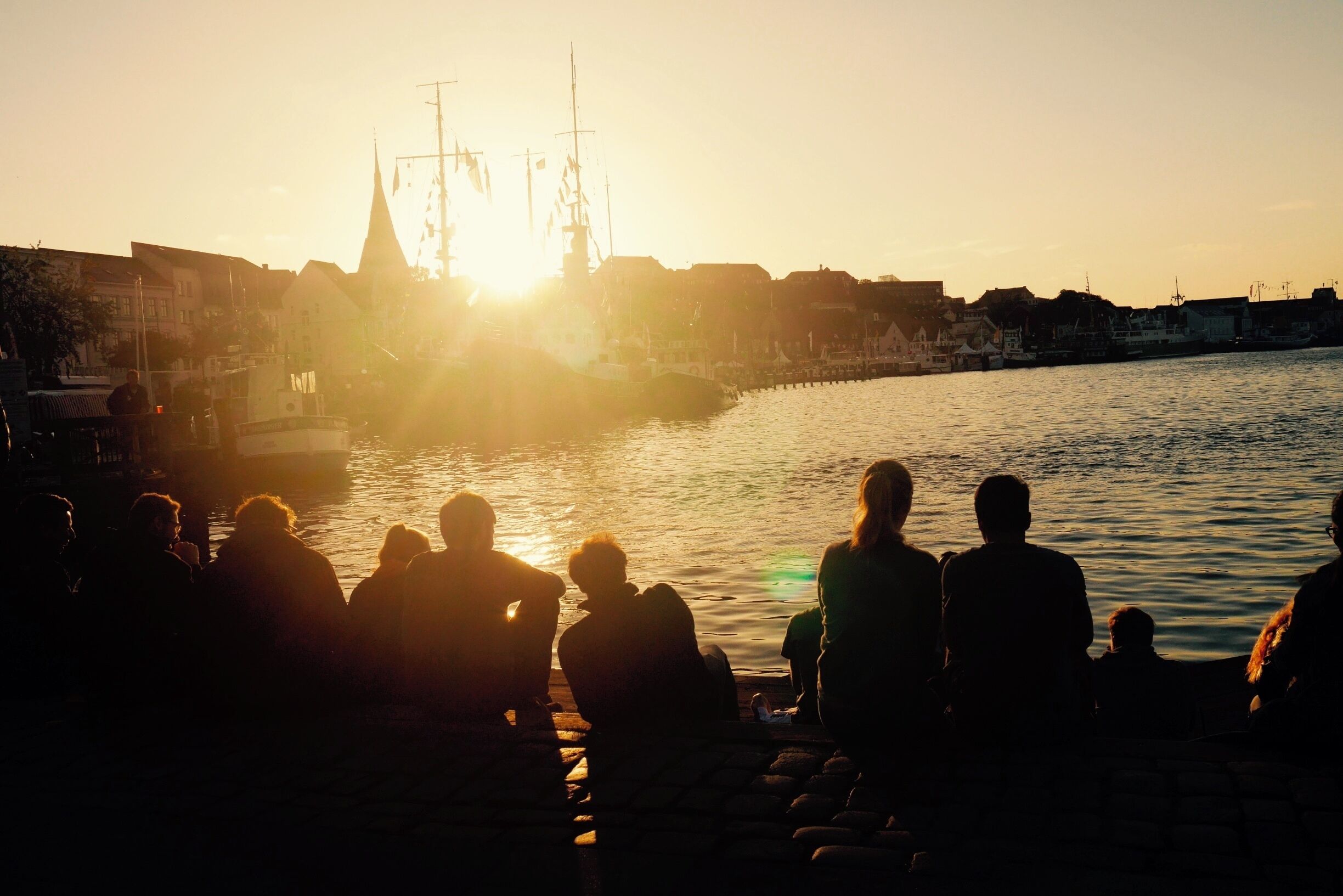 Flensburg harbour by night is beautiful, watching the sun set over the Baltic sea is  a wonderful experience. This is also a perfect time to sample a bottle or two of Flensburg's famous beer 'Flensburger', with it's "POP" lid. There is a fabulous Irish pub just by the harbour to purchase this beer and still enjoy the view.