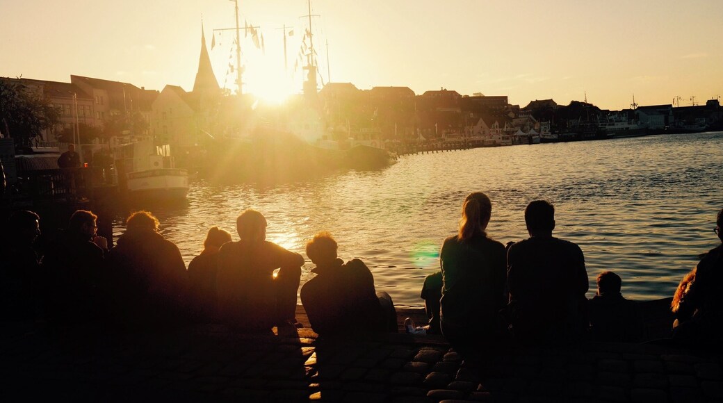 Flensburg harbour by night is beautiful, watching the sun set over the Baltic sea is a wonderful experience. This is also a perfect time to sample a bottle or two of Flensburg's famous beer 'Flensburger', with it's "POP" lid. There is a fabulous Irish pub just by the harbour to purchase this beer and still enjoy the view.