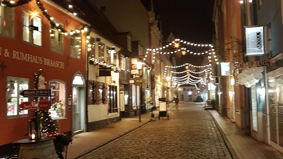 A lovely and warming place to be, a lot of small and nice shops around, lovingly decorated, I love my hometown Flensburg/Germany