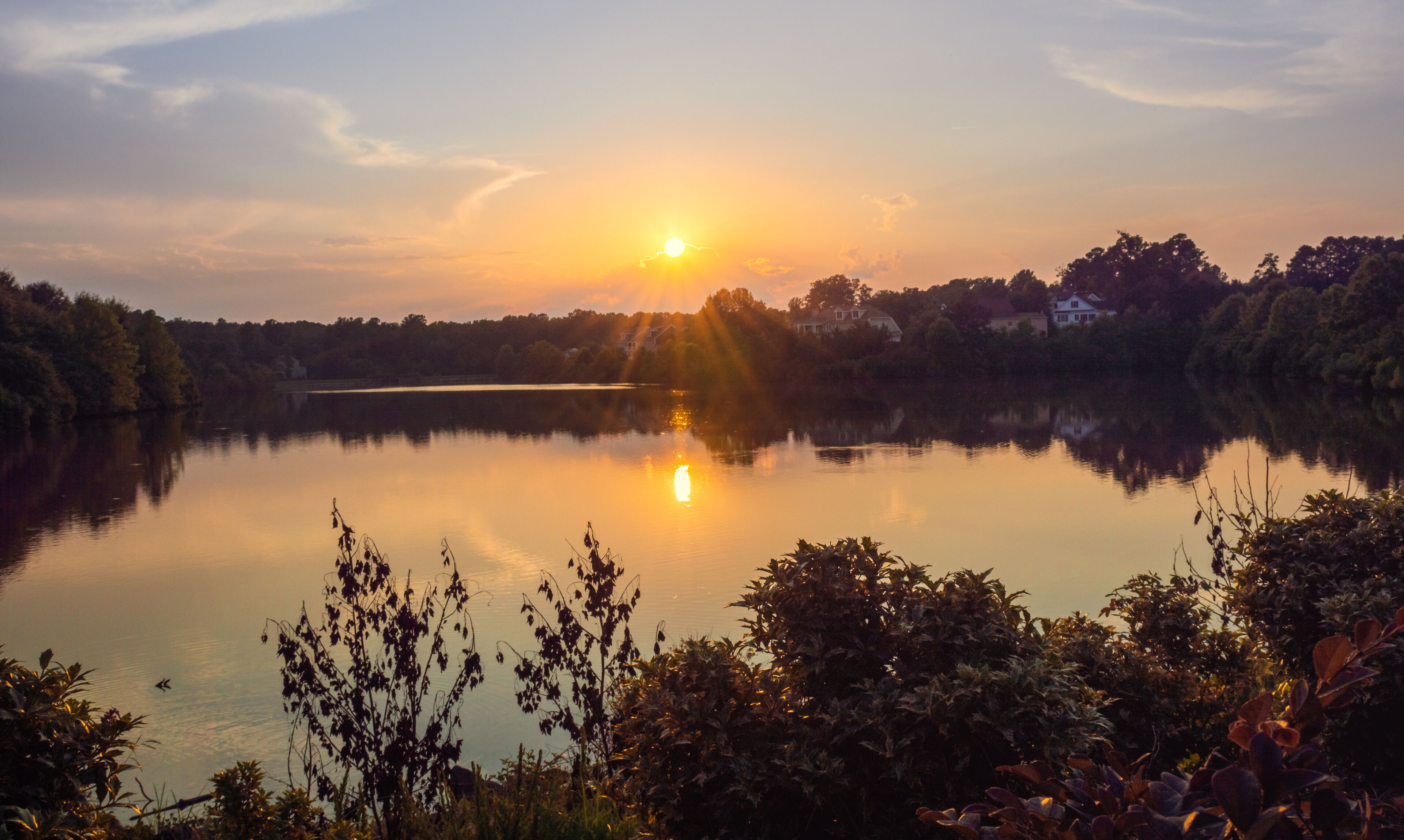Sunset by the Cary Park Lake on a summer day