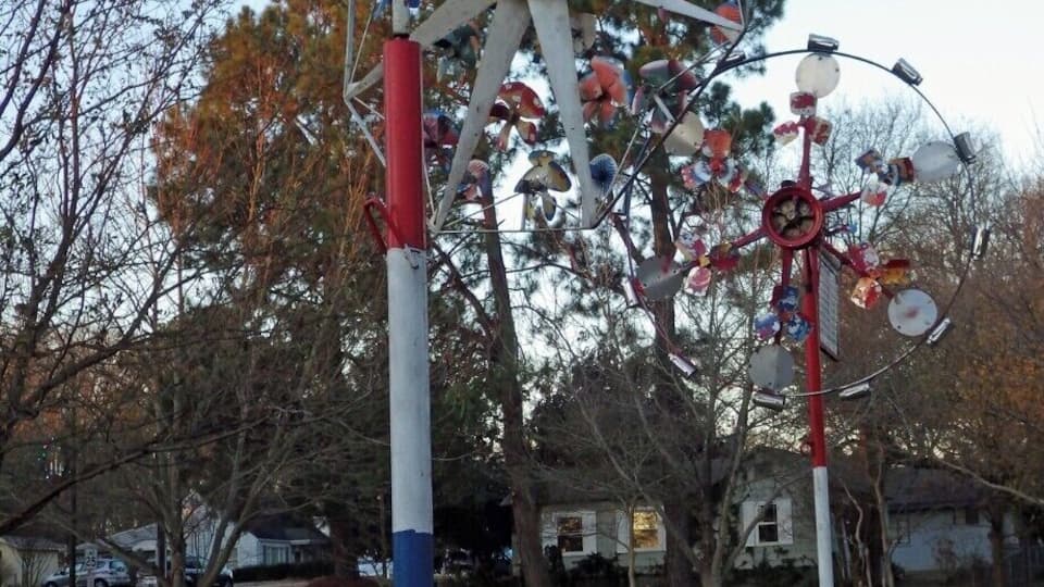 A couple of giant whirligigs in downtown Cary, NC. Vollis Simpson from Wilson made these and also many other whirligigs, many of which are in his hometown of Wilson, NC. Mr. Simpson passed on in June, 2013. His work can also be seen in several folk art collections around the country.