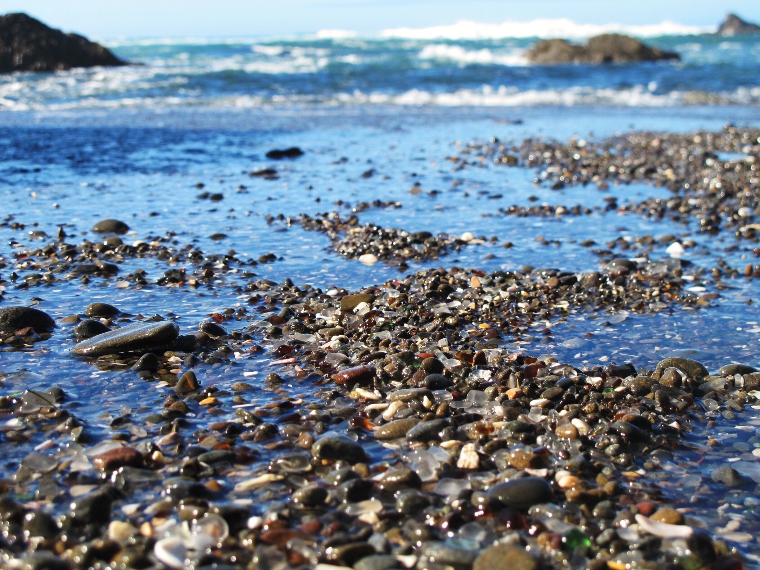 Glass beach - Fort Bragg.
More of a small cove than a beach, not a spectacular find a little different and quirky however. I found it to be an amusing irony if anything. In the past they decided to take the easy option and dump their rubbish and glass in the ocean, which has long since been banned. The sea and wave action has since polished all the glass and it has become a tourist attraction. Despite it not being allowed tourists flock to the location and take a few home as a souvenir to the point now where the authorities are considering adding recycled glass to keep the location viable. Nature's own recycling program in action. #blue