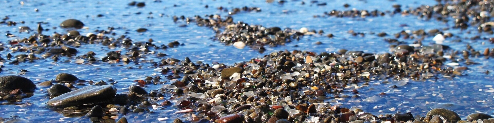 Glass beach - Fort Bragg.
More of a small cove than a beach, not a spectacular find a little different and quirky however. I found it to be an amusing irony if anything. In the past they decided to take the easy option and dump their rubbish and glass in the ocean, which has long since been banned. The sea and wave action has since polished all the glass and it has become a tourist attraction. Despite it not being allowed tourists flock to the location and take a few home as a souvenir to the point now where the authorities are considering adding recycled glass to keep the location viable. Nature's own recycling program in action. #blue
