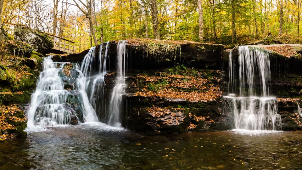 Diamond Notch Falls in Catskill Mountains, New York. West Kill Falls or also called Diamond Notch Falls, is located in the eastern part of the Catskill Mountains and in the town of West Kill.