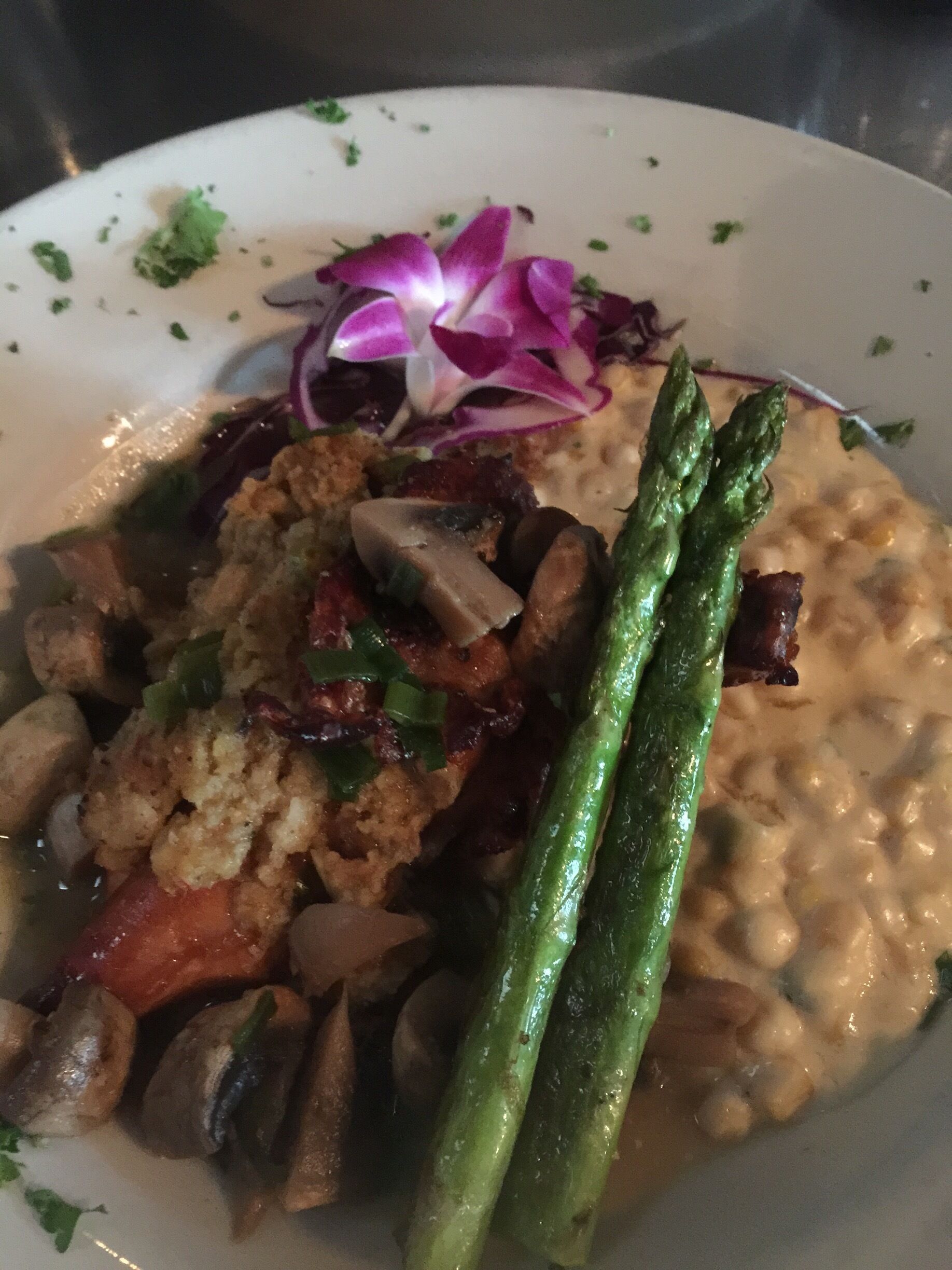 Amazing dinner, started with unique and awesome Escargot and then airline chicken over fresh creamed corn.