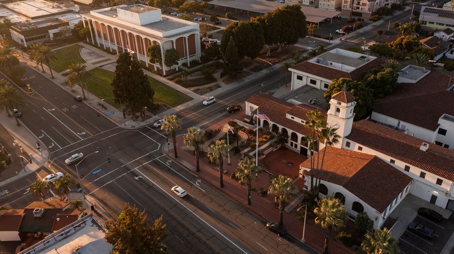 Sunset light shines on the historic downtown City Hall of Fullerton, California, USA.