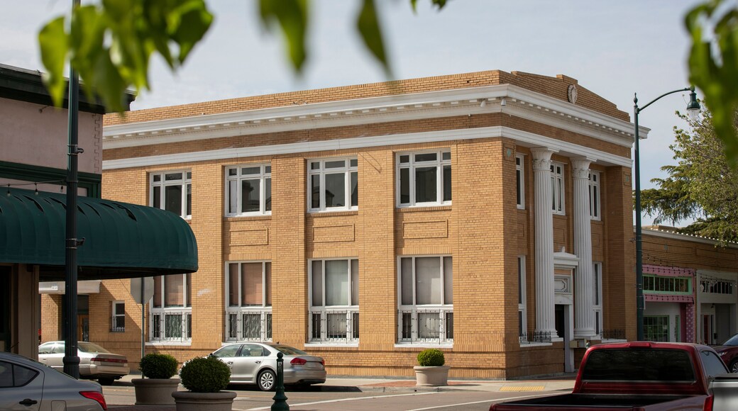 Tracy, California, USA - April 17, 2023: Afternoon sun shines on historic downtown buildings along Central Ave.