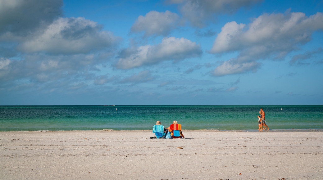 Treasure Island featuring general coastal views and a sandy beach as well as a couple