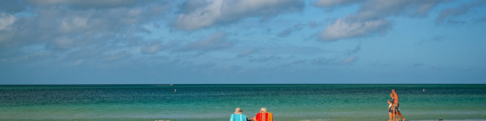 Treasure Island featuring general coastal views and a sandy beach as well as a couple