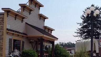 The covered wagon version of a blown out tire at a ridiculous old west themed shopping center in rural PA.