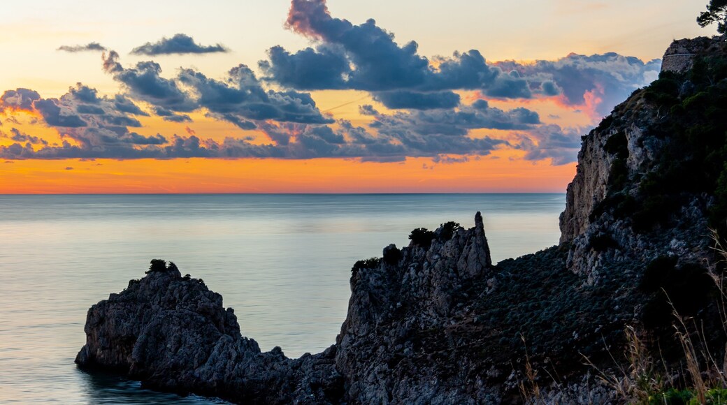 Rocky coast of Riviera of Ulysses at Sunset, Sperlonga Italy