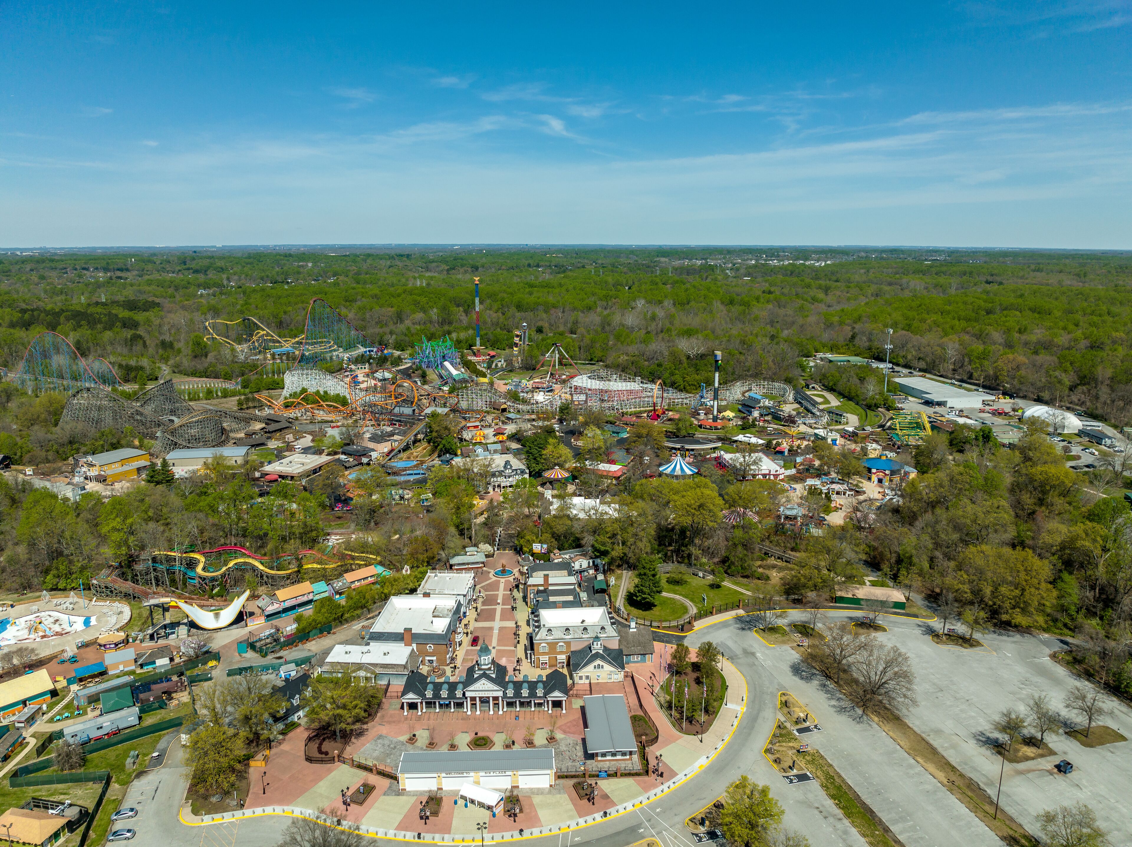 Aerial view of American amusement park with empty rides, roller coasters during the pandemic